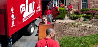 123JUNK team hauling furniture